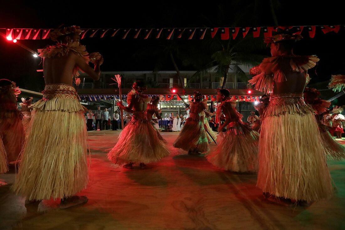 Marshallese performers in a traditional Jabwa stick dance