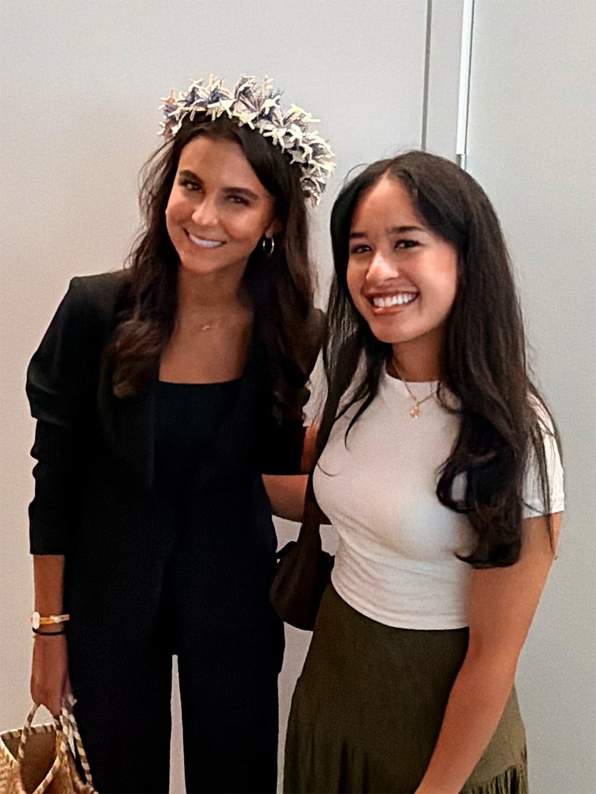 Leyla Tore wearing a wūj, a woven head garland she was given at the event.